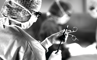 Nurse holding LAP BiSect in hospital.